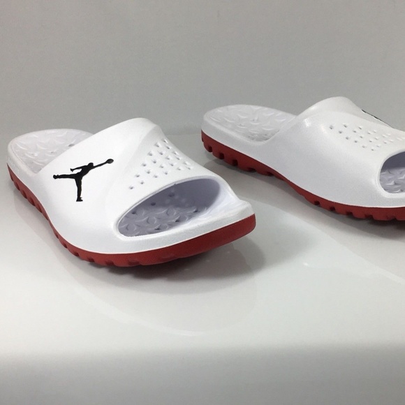 white and red jordan slides